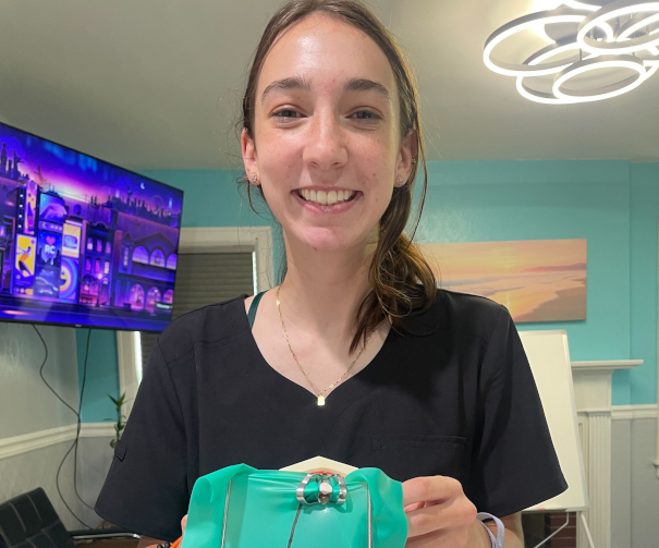 Anderson Dental Assistant School student working in dental office
